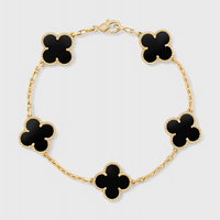 Bracelet avec Motif de Trèfle et Élégance Dorée
