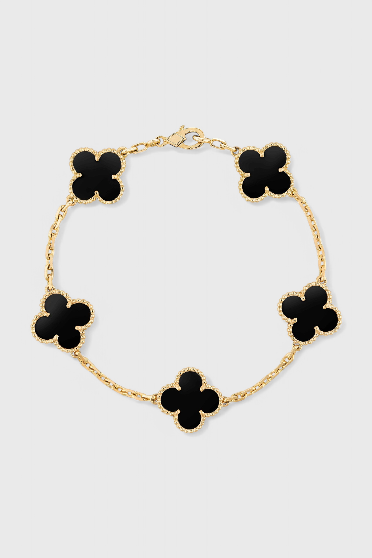 Bracelet avec Motif de Trèfle et Élégance Dorée