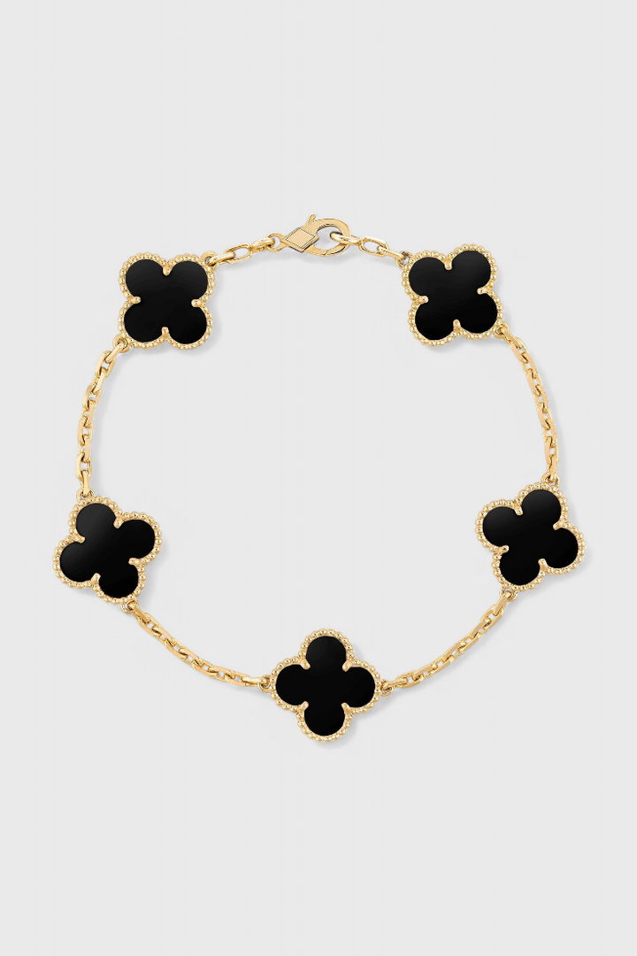 Bracelet avec Motif de Trèfle et Élégance Dorée
