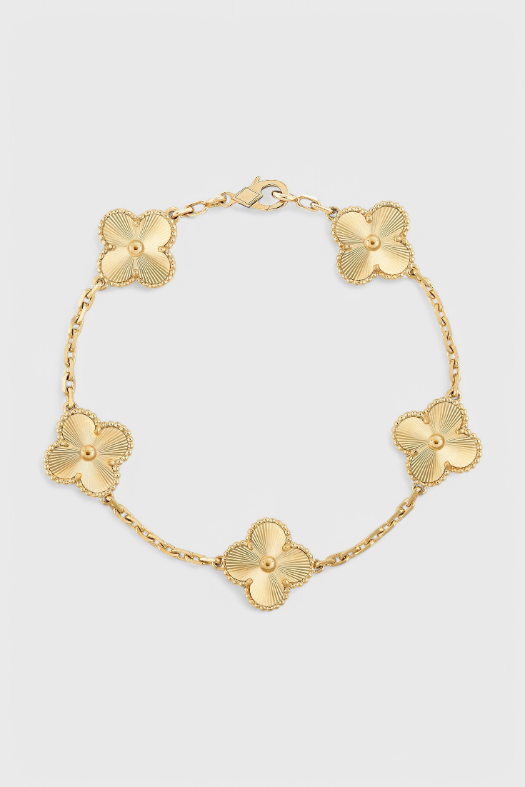 Bracelet avec Motif de Trèfle et Élégance Dorée