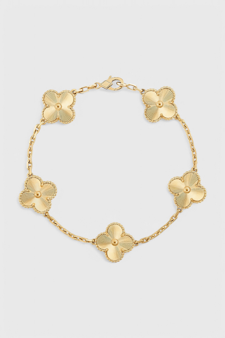 Bracelet avec Motif de Trèfle et Élégance Dorée
