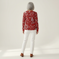 Renske - Pull de Noël rouge à motifs blancs